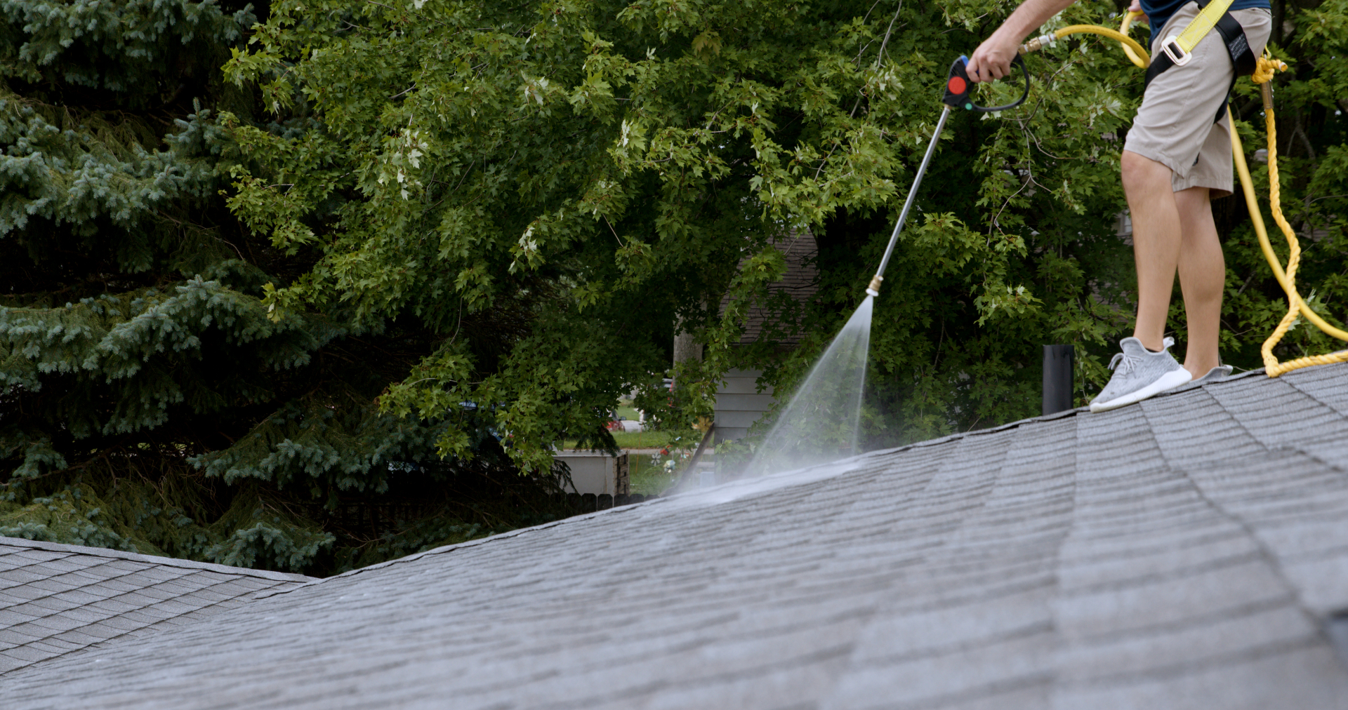 OC Roof Rescue technician applying GreenSoy treatment